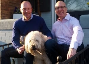 The author, Jon, and his husband with their shaggy dog.