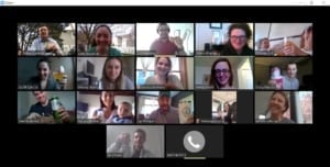 A group of people participating in a virtual happy hour.